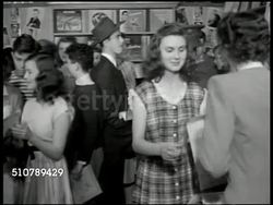 Music store shop crowded with teens Instructional Video