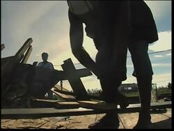 Survivors begin cleaning up debris after Hurricane Felix, aid News Clip