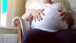 Pregnant Woman stroking her tummy. HD Stock Footage