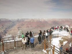 WS PAN Tourists watching Grand Canyon at Mather Point in winter / Grand Canyon National Park, Arizona, USA Stock Footage