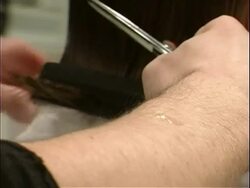 Young women getting herhair cut at the Hair salon Stock Footage