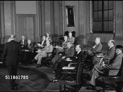 1946: CORPORATE MEETING: VS Men attending meeting. IMPLIED NYSE Board of Governors (not confirmed). CU Instruction page for listing stock. CORPORATE MEETING: VS Men in meeting at table in conference room. Instructional Video