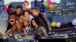 Young friends taking selfie at urban rooftop party Stock Footage