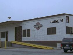 WS ZI View of white wood bulinding of Downeast Quality Footwear / California, United States Stock Footage