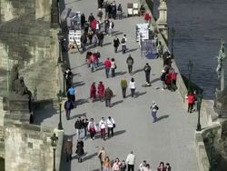 MS People walking on charles bridge over vltava river / Prague, Hlavni mesto Praha, Czech Republic Stock Footage