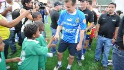 CLEAN: Ex-Brazil coach Dunga brings football magic to Caracas suburbs News Clip