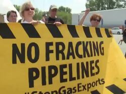 Environmentalists march, hold signs and chant against the Cove Point liquefied natural gas facility Stock Footage