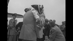 Chief William Smith and Sergeant Elmer Bender return home after being held by the Chinese for 19 months News Clip