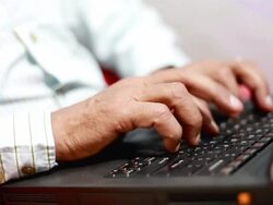 Hands of Senior Man Typing Using Laptop Close up Stock Footage