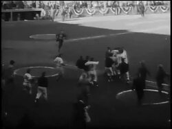 B/W 1956 New York Yankees crowding around Don Larsen after completion of the first 'perfect game' in World Series history / Game 5 / NYC Stock Footage