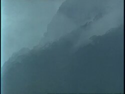 WA dark mountainside with mist in valleys, Uganda, Africa Stock Footage