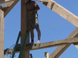 MA TD Carpenters at working while framing an energy efficient post / Grass Lake, Michigan, USA Stock Footage