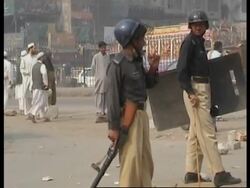 Police use batons and tear gas to disperse Bhutto supporters Instructional Video