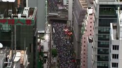 Thousands protest against chief executive on handover anniversary Instructional Video