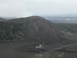 WS View of Kilauea Iki Crate trail in Volcanoes National Park with steam rising from vents and  hill in the background / Volcano, Hawall, Big Island, United States Stock Footage