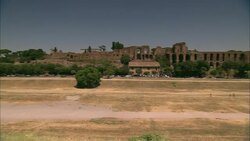 Traffic flows near Circus Maximus in Rome, Italy. Stock Footage