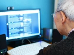 Senior Chinese Man Using a Computer Stock Footage