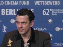 Christian Petzoldat, winner of best director at Winners Press Conference Reactions:at the Grand Hyatt on February 18, 2012 in Berlin, Germany. Stock Footage