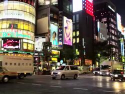 Lit Buildings at Ginza at Night with Ginza Line Subway Entrance, Tokyo, Japan Stock Footage