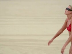 MS PAN TU TD Women playing beach volleyball and celebrating point / Redondo Beach, California, United States Stock Footage