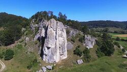 Climbing Rock In Jurassic Mountain Range Stock Footage