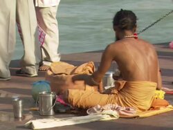 MS Man sitting near Ganges river / Haridwar, Uttarakhand, India Stock Footage