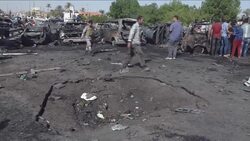 CLEAN : Blasts kill 19 as Kerry visits Iraq capital News Clip