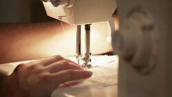 Tailor works with sewing machine Stock Footage