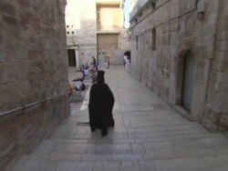 WS POV TU Priest walking in Holy Sepulchre courtyard / Jerusalem, Israel Stock Footage
