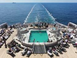 WS POV View of People resting and swimming on Cruise ship Queen Mary 2 / Stavanger, Rogaland, Norway Stock Footage