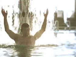 HD SLOW MOTION: Man Enjoying Spa Waterfall Stock Footage