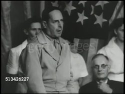 1942: AUSTRALIAN MEETING:  U.S. General of the Army Douglas MacArthur (1880-1964) at dinner table during conference (unconfirmed), Prime Minister of Australia John Curtin (1885-1945) sitting BG, MacArthur speaking about war pledge (SOT). WWII Instructional Video