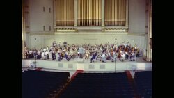 WS HA Conductor directing orchestra on stage in Symphony Hall, Boston, Massachusetts, United States Stock Footage