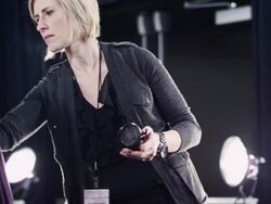 MS TU PAN Female fashion models backstage at fashion show make-up artist applying make-up Stock Footage