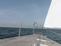 MS Sailboat surfing at full speed toward horizon / Wismar, Mecklenburg-Vorpommern, Germany Stock Footage