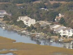 MS AERIAL Shot of houses surrounded by trees near Long beach / North Carolina, United States Stock Footage