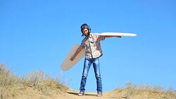 boy with wings playing pilot Stock Footage