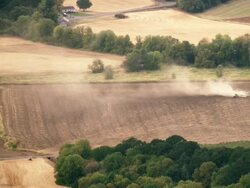 WS SLO MO View of tractor plows his field as seen from up high / Cornelius, Oregon, United States  Stock Footage