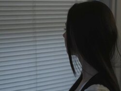 HD CRANE: Shadowy figure looking through blinds (shot on RED) Stock Footage