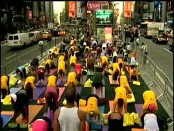 Yoga enthusiasts practice in NYC's Times Square News Clip
