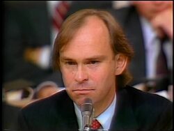July, 1987 close up House counsel John Nields at microphone waiting for answer during Iran-Contra hearings Stock Footage