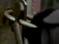 ECU TU Man closing and opening padlock on door, Brooklyn, New York City, New York State, USA Stock Footage