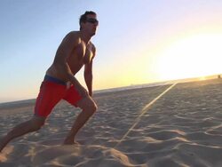 Men playing beach volleyball. - Slow Motion - filmed at 240 fps Stock Footage