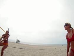 WS POV SLO MO Women playing beach volleyball / Redondo Beach, California, United States Stock Footage