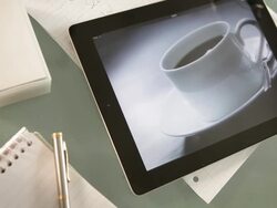 Tablet pouring coffee Stock Footage