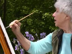 Close up of Senior Female Painting Stock Footage