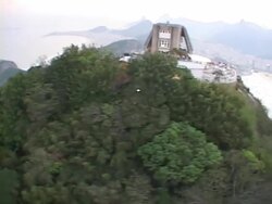 AERIAL, Brazil, Rio de Janeiro and Sugarloaf Mountain with cable car station on top Stock Footage