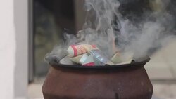 Burning paper item pass to death man Stock Footage