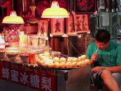 MS Food stalls in night market/xian,shaanxi,China Stock Footage