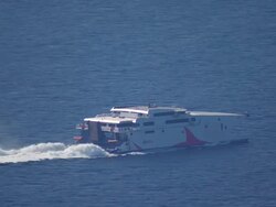 WS AERIAL ZO Shot of seajet and many freighters / Piraeus, Peloponnese, Greece Stock Footage